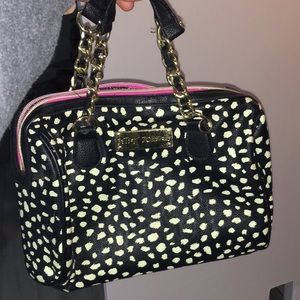 Betsy Johnson purse with pink interior